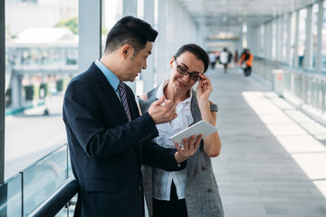 Business people using digital tablet stock photo