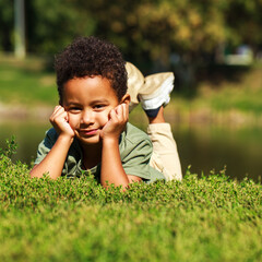 Portrait of little boy in autumn park