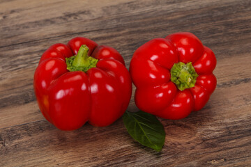 Ripe Red bell pepper over wooden