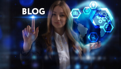 Business, Technology, Internet and network concept. Young businessman working on a virtual screen of the future and sees the inscription: Blog