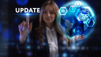 Business, Technology, Internet and network concept. Young businessman working on a virtual screen of the future and sees the inscription: Update