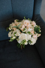 The original bouquet of flowers in the hands of women
