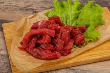 Raw beef meat sliced for cooking