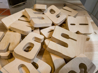 wooden figures on a plastic box shop