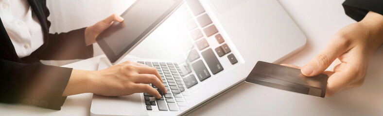 Searching Browsing Internet Data Information with blank search bar.businessman working with smart phone, tablet and laptop computer on desk in office. Networking Concept