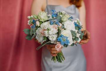 woman holding a boquet