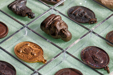 Small Buddha image or Thai amulet