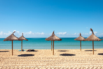Palma beach with umbrellas and without hammocks