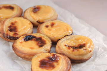 Traditional Portuguese popular dessert Pastel de nata or Pastel de Belem. Delicious puff pastry cups with custard.