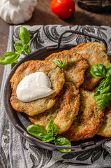 Potato pancakes with garlic and herbs