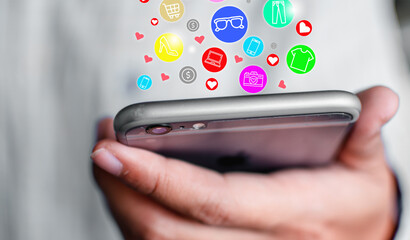 Icon showing online shopping symbol on mobile phone Concept of online shopping through the Internet