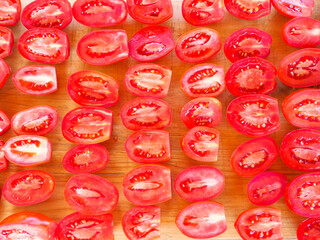 sliced tomatoes on a Board. drying sweet tomatoes. taste of summer.