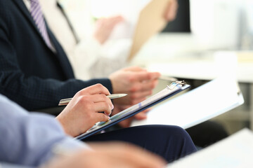 Group of people clap their arm in row during seminar closeup. Great news brief achievement win deal...