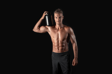 Fototapeta na wymiar Handsome Muscular Topless Man, Protein jar studio