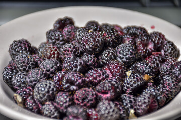 black raspberries close-up on plate