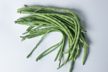 green beans on a white background. Harvesting. Home cooking