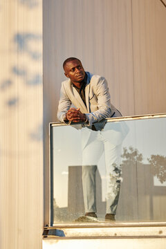 African American businessman at sunset in a building.