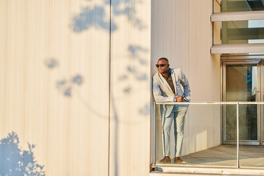African American businessman at sunset in a building.