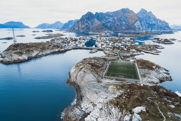 soccer field on the cliffs of Henningsv√¶r by the sea