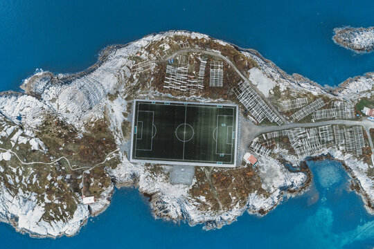 soccer field on the cliffs of Henningsv√¶r by the sea