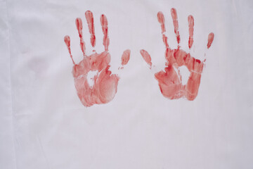 red silhouette of handprints isolated on white background