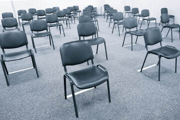 Social distance concept; Chair in stadium. Keep space between chair during Coronavirus (Covid-19) pandemic Social distancing, New normal, Healthcare concept.