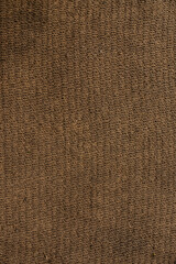 dense floor rug with granular texture of orange color. background for an inscription.