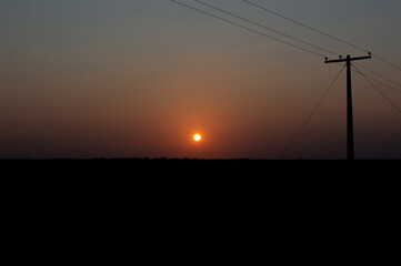 power lines at sunset