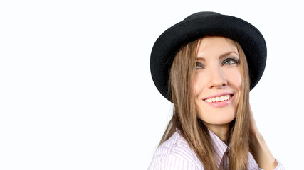 Portrait of a beautiful woman in a  felt hat. Laughing girl