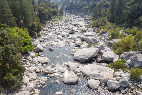 The beautiful Feather River flows through a scenic canyon in Northern California' Sierra Nevada Mountains. This beautiful flow of water is the principal tributary to the Sacramento River.