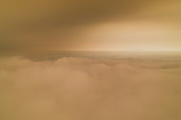A layer of thick smoke, generated by many wildfires, darkens the sky above the marine layer over the San Francisco Bay Area. Fires have caused severe air pollution problems throughout the west coast.