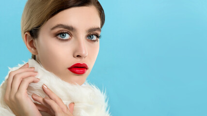 Portrait of beautiful young woman wearing red clothes with perfect young skin, red matt lips and...