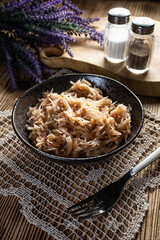 Stewed cabbage with onion and tomato.