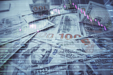 Multi exposure of forex chart drawing over us dollars bill background. Concept of financial success markets.