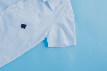 ink stain on shirt pocket.daily life dirty stain for wash and clean concept