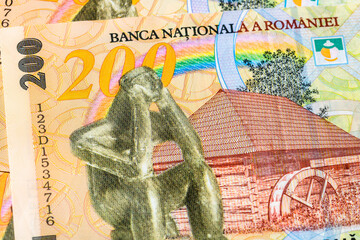 Selective focus on detail of lei banknotes. Close up macro detail of romanian lei banknotes, 200 lei isolated. World money concept, inflation and economy concept