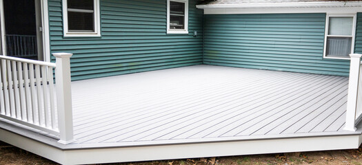 New composite decking installed on back of house