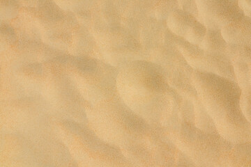 Fototapeta na wymiar Sand on the beach as background. Dune sand