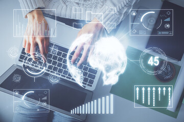 Multi exposure of woman hands working on computer and forex chart hologram drawing. Top View. Financial analysis concept.