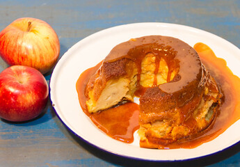 bread pudding made with stale bread, milk, eggs and sugar, decorated with liquid caramel and dulce de leche