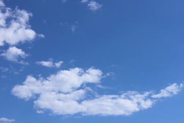 Naklejka na ściany i meble Blue sky with a cloud. Copy space