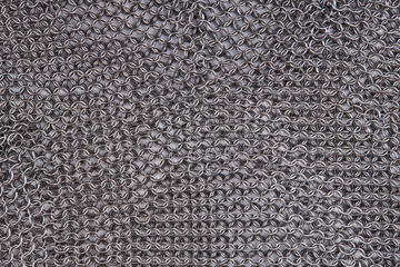 chain mail close up texture background. abstract iron ring backdrop. protection concept
