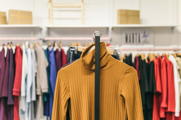 Obraz premium Fashion stylish luxury clothes display. Image and stylish services, selection of colors, types. Capsule fall wardrobe
