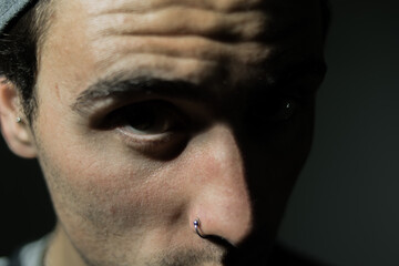 Obraz premium young man with hat winter concept positive advertising coat campaign, menswear, man alone