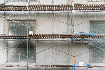 Scaffolding at the facade of the building under repair