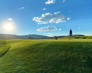 Playing golf in Colorado on a beautiful sunny day