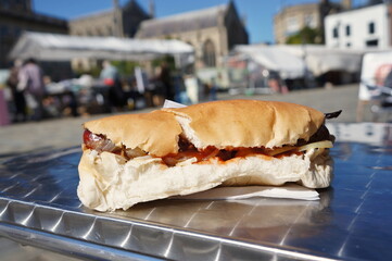 Hot dog on a napkin at an outdoor eating place