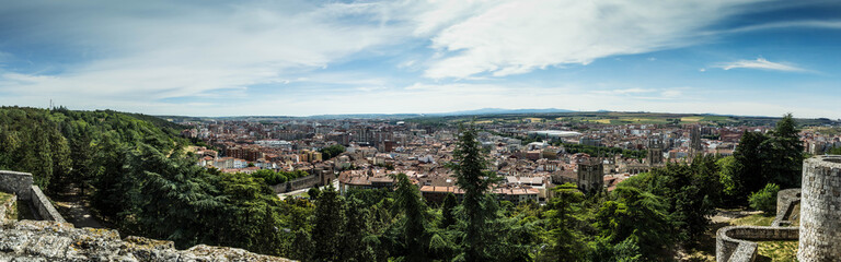 Fototapeta na wymiar Panoramic view of the city of Burgos (06/26/2019). Capital of the province of Castilla y León, Spain. On the right the cathedral of Santa Maria in Gothic style. Large format. 