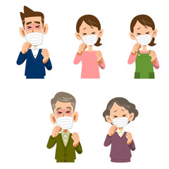 マスクをつけて咳をする男性と女性
