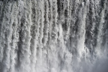 Closeup of water falling on Dettifoss waterfall in Iceland.